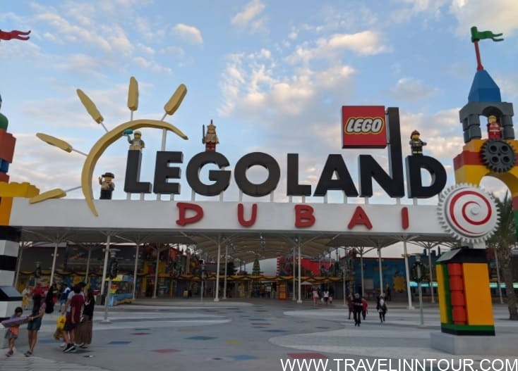 Entrance to LEGOLAND Dubai theme park with large LEGO-themed sign and colorful decorations, highlighting a popular family attraction in Dubai.