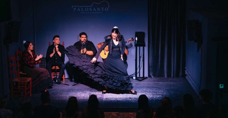 Flamenco performance at Palosanto in Valencia with dancers and musicians on stage